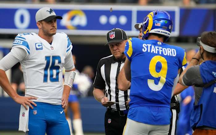 Oct 24, 2021; Inglewood, California, USA; Detroit Lions quarterback Jared Goff (16) and Los Angeles Rams quarterback Matthew Stafford (9) during the coin flip before the start of the Rams-Lions game at SoFi Stadium. Mandatory Credit: Robert Hanashiro-USA TODAY Sports